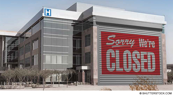 hospital with sign on side: Sorry We're Closed